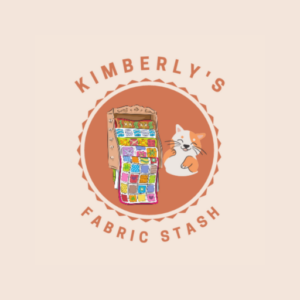 Kimberly’s Quilt Shop logo featuring a quilt and cat representing quilt fabric and learning